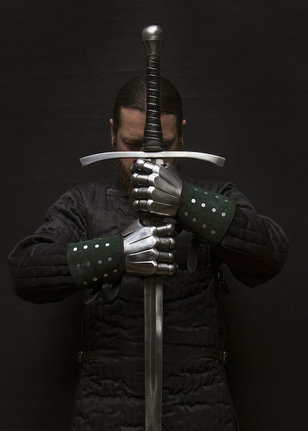 Gauntlet Holding Sword
